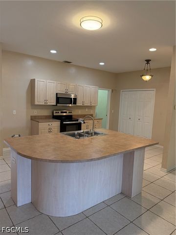 721 Milwaukee BLVD, Lehigh Acres, FL 33974
