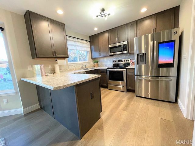 1102 STONE HENGE Court, Pevely, MO 63070