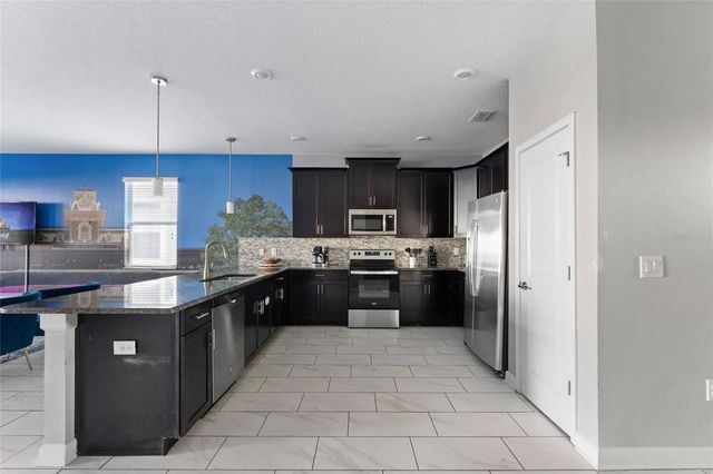 1513 MULLIGAN BOULEVARD, Davenport, FL 33896