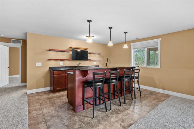 5730 Summerset Woods Drive, Alto, MI 49302
