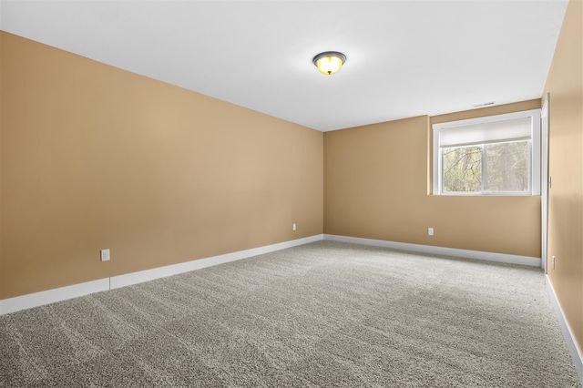 5730 Summerset Woods Drive, Alto, MI 49302