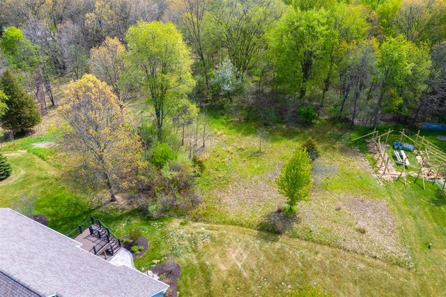 5730 Summerset Woods Drive, Alto, MI 49302