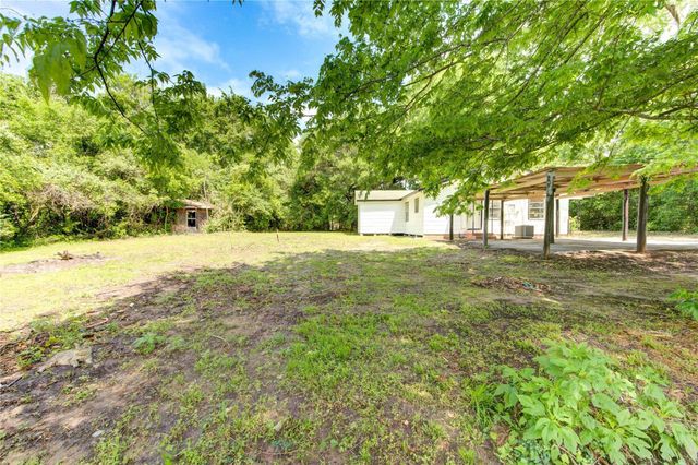 808 State Highway Loop 393, Goodrich, TX 77335