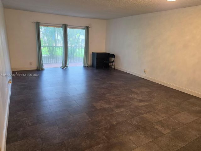 5961 N Falls Cir Drive 109, Lauderhill, FL 33319
