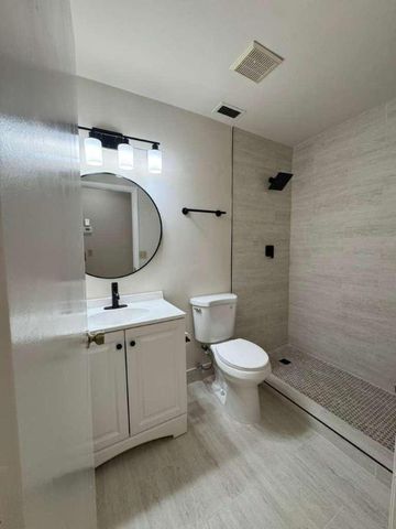 615 Sea Pine Way E, Greenacres, FL 33415