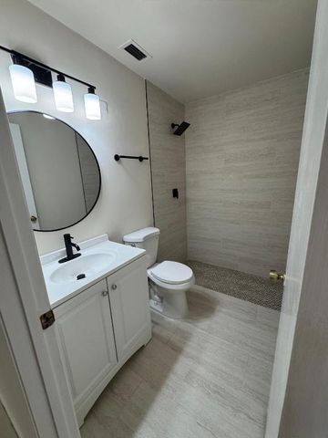 615 Sea Pine Way E, Greenacres, FL 33415