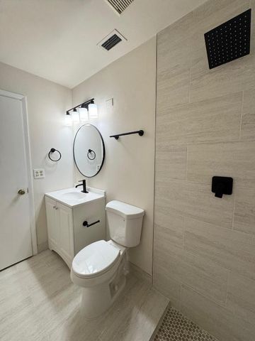 615 Sea Pine Way E, Greenacres, FL 33415