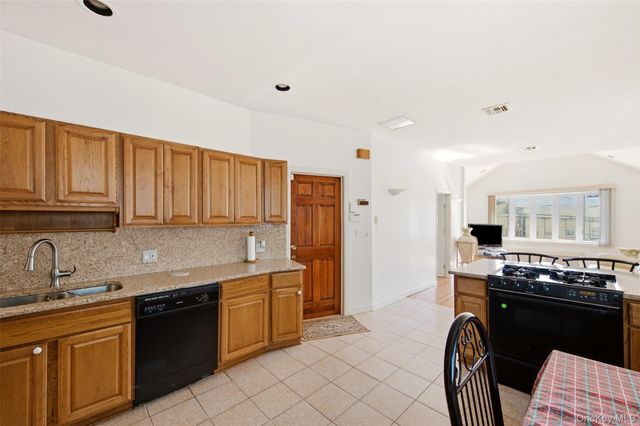 9725 91st Street, Ozone Park, NY 11416