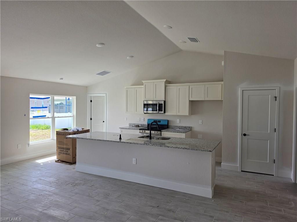 1815 NW 31st PL, CAPE CORAL, FL 33993 — photo 3