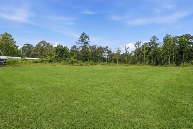 672 County Road 3317, Cleveland, TX 77327