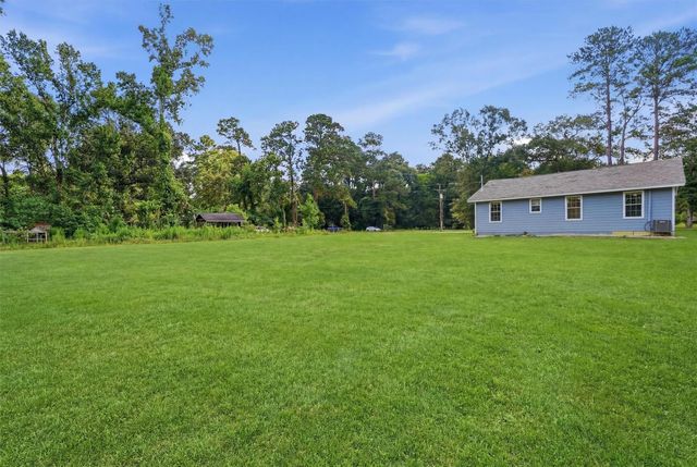 672 County Road 3317, Cleveland, TX 77327