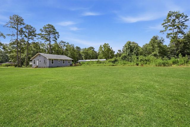 672 County Road 3317, Cleveland, TX 77327