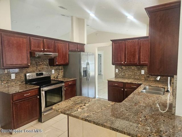 1040 Big Horn Circle NW, Palm Bay, FL 32907