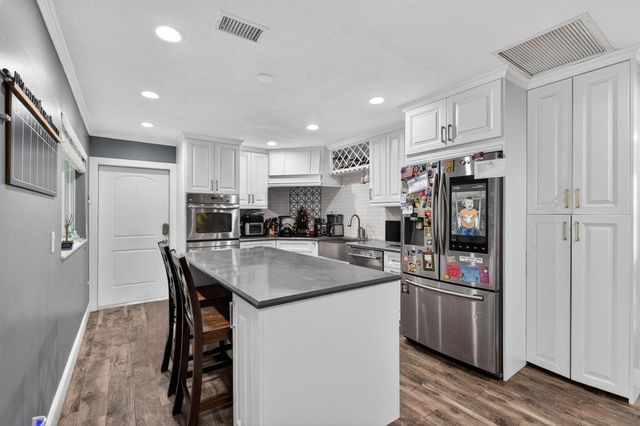 8669 Nashua Drive, Palm Beach Gardens, FL 33418