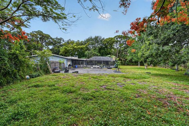 8669 Nashua Drive, Palm Beach Gardens, FL 33418