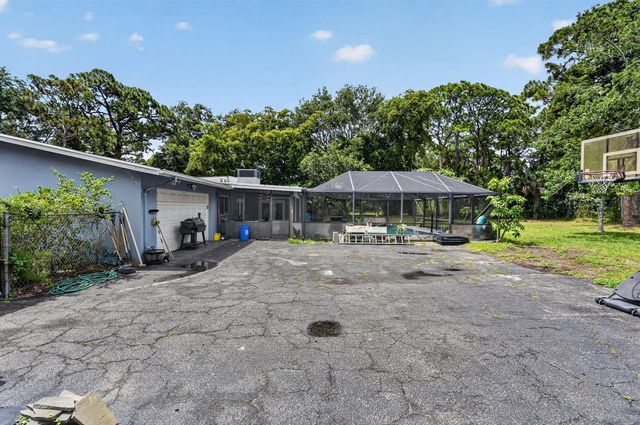 8669 Nashua Drive, Palm Beach Gardens, FL 33418