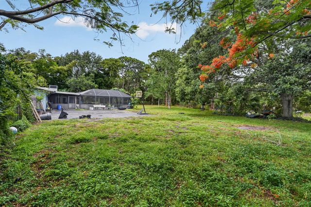 8669 Nashua Drive, Palm Beach Gardens, FL 33418