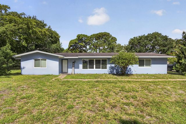 8669 Nashua Drive, Palm Beach Gardens, FL 33418