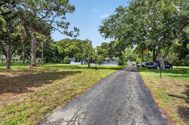 8669 Nashua Drive, Palm Beach Gardens, FL 33418