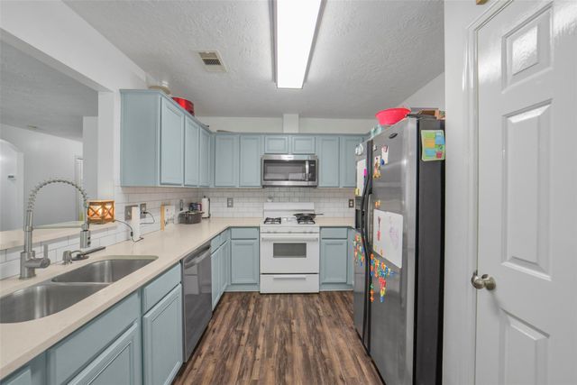 12023 Belle Court, Pinehurst, TX 77362