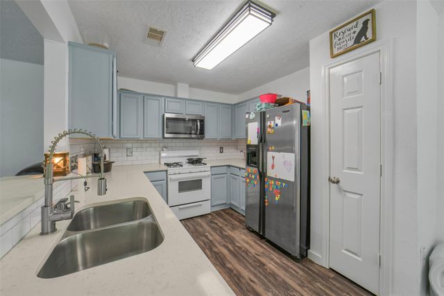 12023 Belle Court, Pinehurst, TX 77362