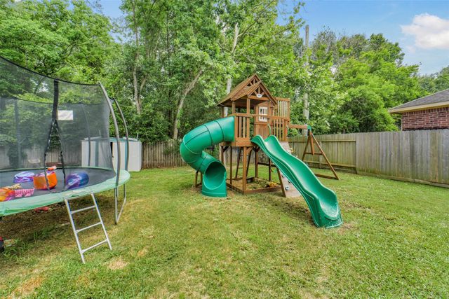12023 Belle Court, Pinehurst, TX 77362