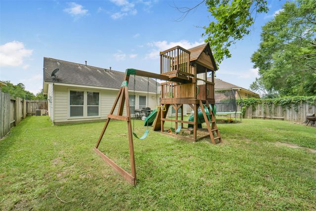12023 Belle Court, Pinehurst, TX 77362
