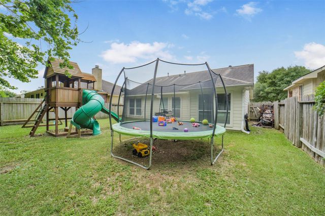 12023 Belle Court, Pinehurst, TX 77362
