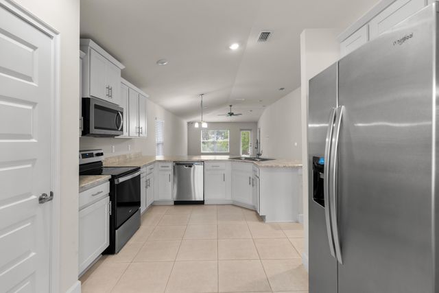 886 NE Whistling Duck Way, Port St. Lucie, Port St Lucie, FL 34983