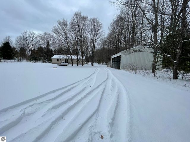 10511 Lake Of The Woods Road, Mancelona, MI 49659