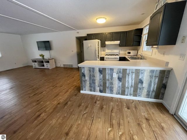 10511 Lake Of The Woods Road, Mancelona, MI 49659