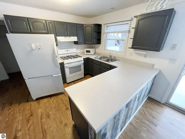 10511 Lake Of The Woods Road, Mancelona, MI 49659