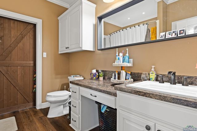 124 WOODPECKER RD, Gladewater, TX 75647