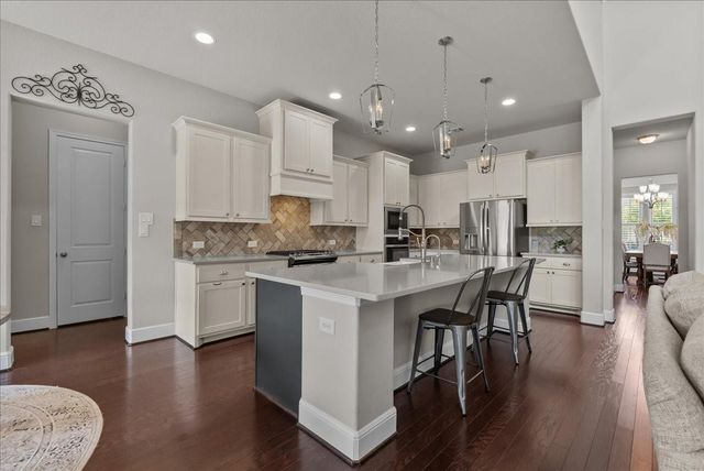 1704 Waterlilly River Lane, League City, TX 77573