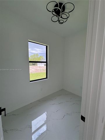 842 Nina Avenue, Lehigh Acres, FL 33974