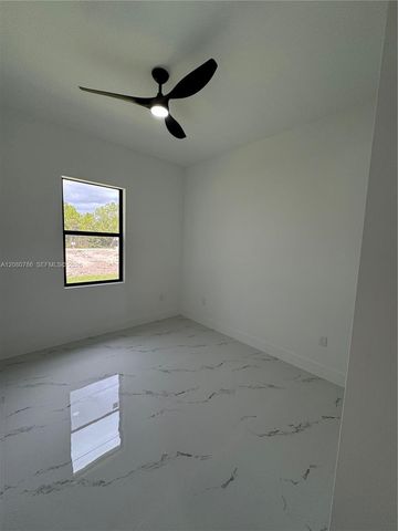 842 Nina Avenue, Lehigh Acres, FL 33974
