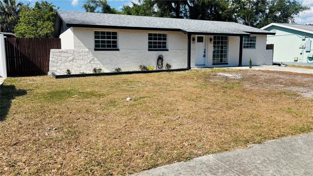 6456 WILLOW WOOD LANE, Tampa, FL 33634