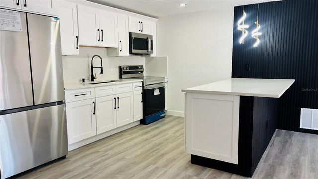 6456 WILLOW WOOD LANE, Tampa, FL 33634