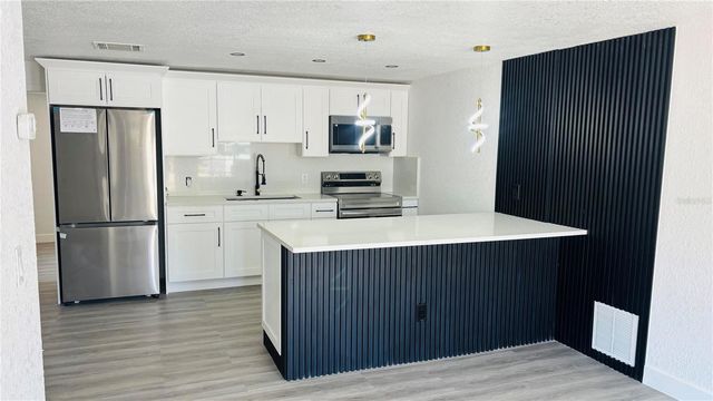 6456 WILLOW WOOD LANE, Tampa, FL 33634