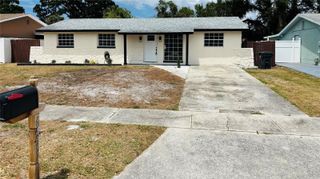 6456 WILLOW WOOD LANE, Tampa, FL 33634