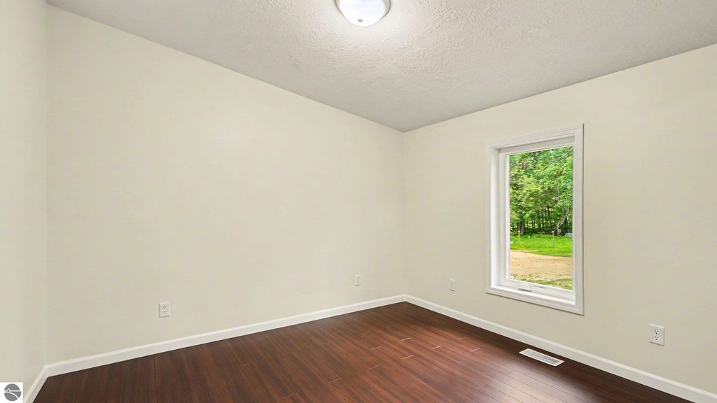 Image 22 of property listing at 6820 W Shore Drive, Weidman, MI 48893