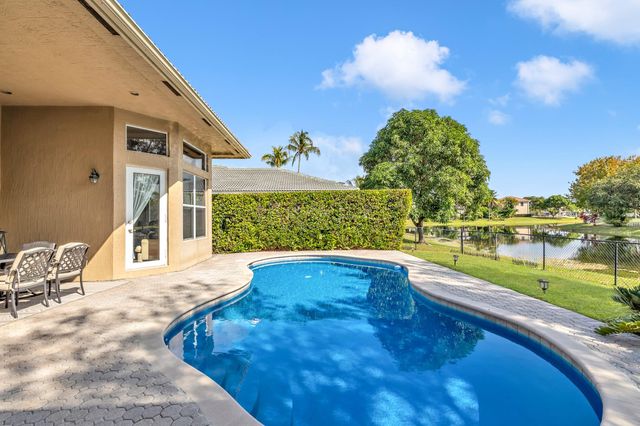 12040 NW 49th Dr, Coral Springs, FL 33076