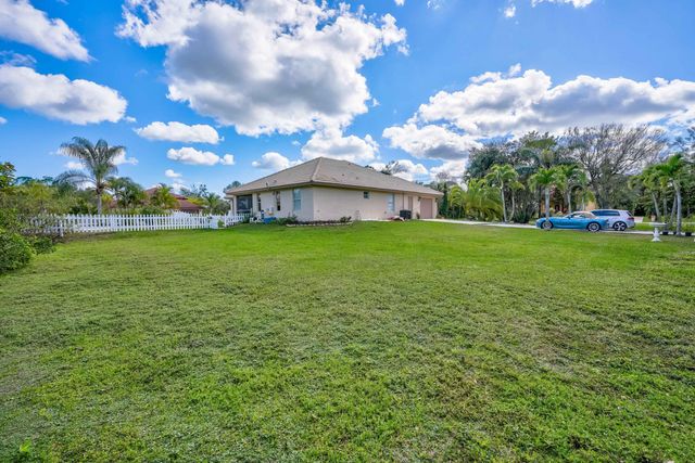 8671 N 155th Pl Place N, Palm Beach Gardens, FL 33418