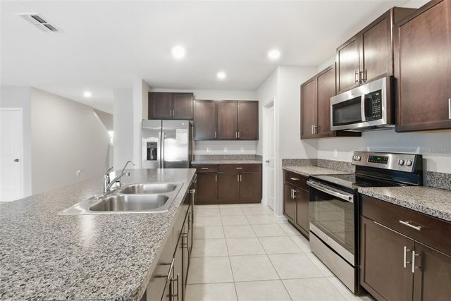 7329 CANTERBURY BELLS COURT, Tampa, FL 33619