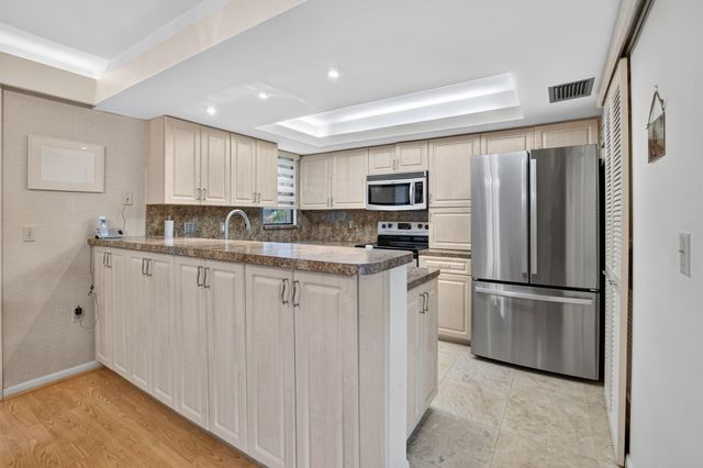 7033 Rain Forest Drive D-4-L, Boca Raton, FL 33434