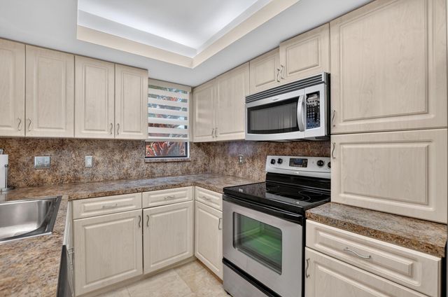 7033 Rain Forest Drive D-4-L, Boca Raton, FL 33434