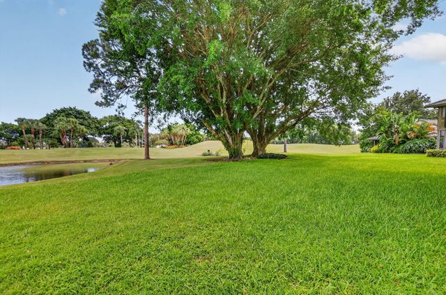 7033 Rain Forest Drive D-4-L, Boca Raton, FL 33434