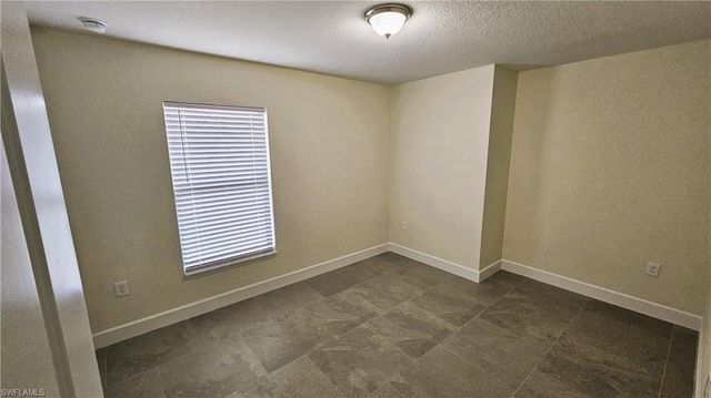 1125 Copley ST E, Lehigh Acres, FL 33974