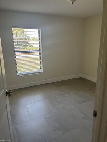 1125 Copley ST E, Lehigh Acres, FL 33974