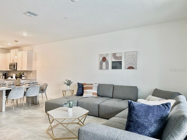 8867 CABOT CLIFFS DRIVE 104, Davenport, FL 33896